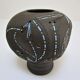 Anthropomorphic candle holder, scarified ceramic, stamped design