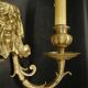 Pair of wall sconces with grotesque heads in 19th-century Renaissance style - bronze