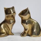 Set of three brass cats