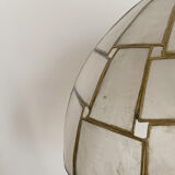 Table lamp with a lampshade with mother-of-pearl set with checkerboard brass and a gilded foot