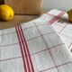Old embroidered tea towels
