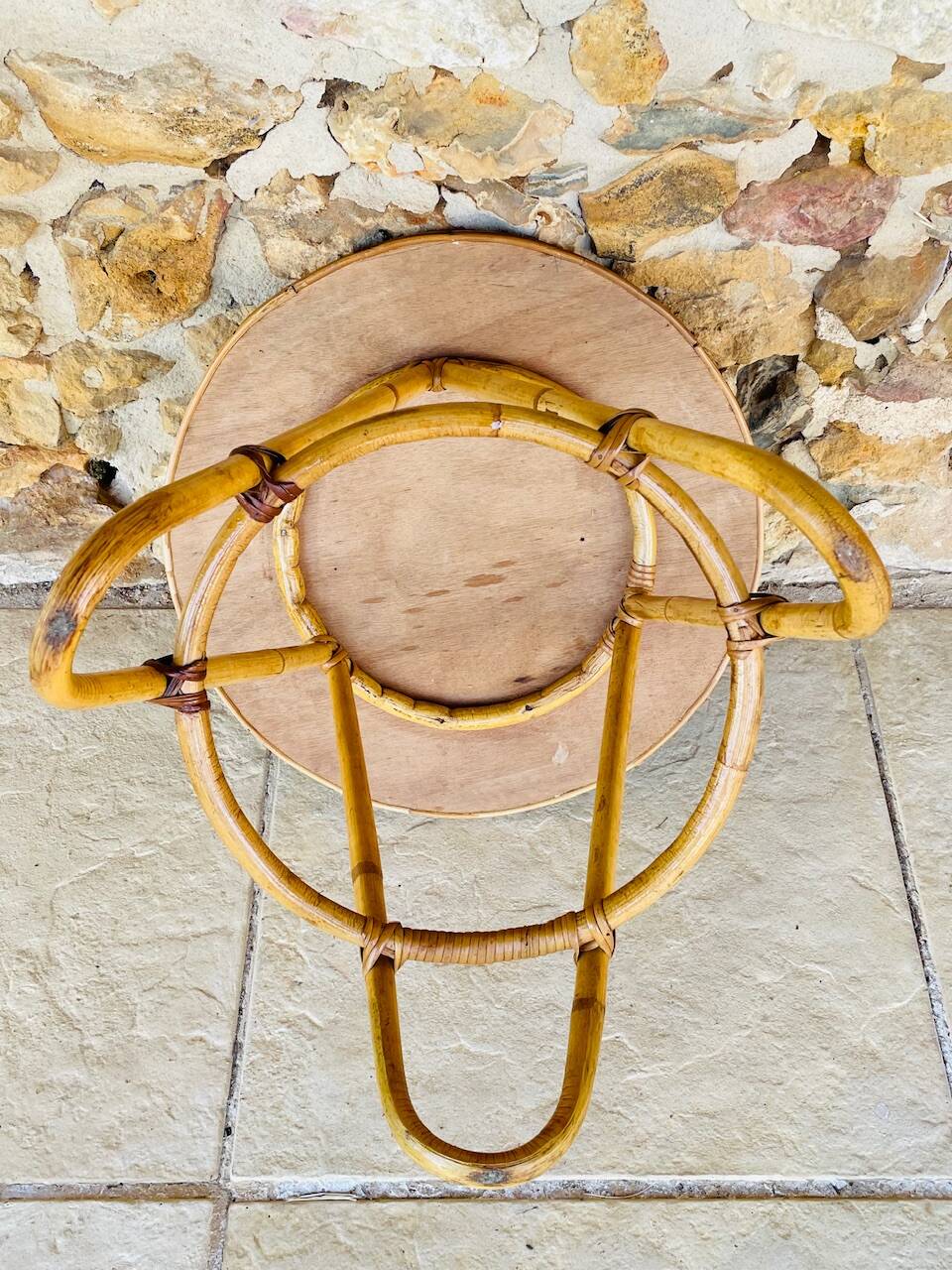 Vintage rattan and bamboo side table, circa 1969.