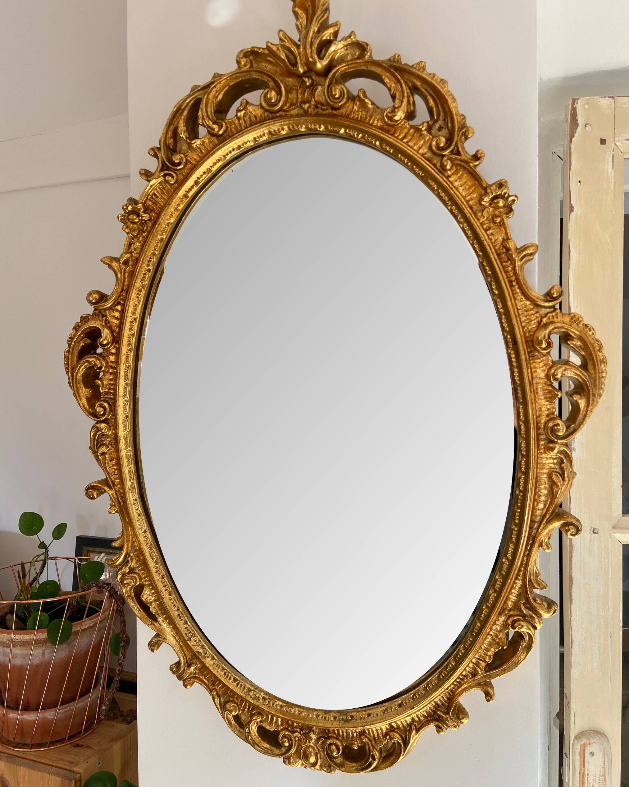 Beautiful Baroque Style Oval Decorative Mirror - Gilded with gold leaf with a Beautiful Patina