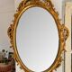 Beautiful Baroque Style Oval Decorative Mirror - Gilded with gold leaf with a Beautiful Patina