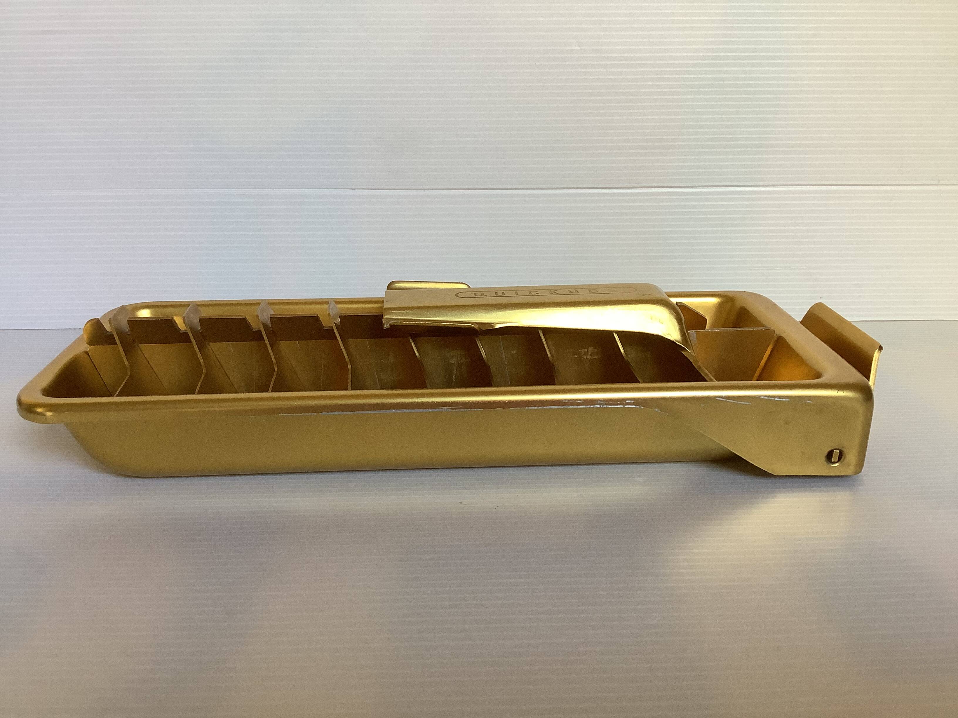 Old gold metal ice cube tray