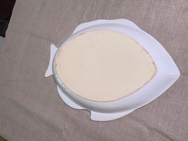 Serving dish in the shape of a white glazed ceramic fish