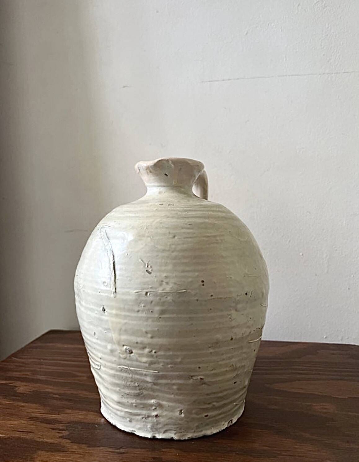 Wabi-sabi amphora vase in off-white and glazed, France circa 1970.