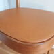 Bistro chair Baumann 1963 curved wood and skaï imitation leather caramel