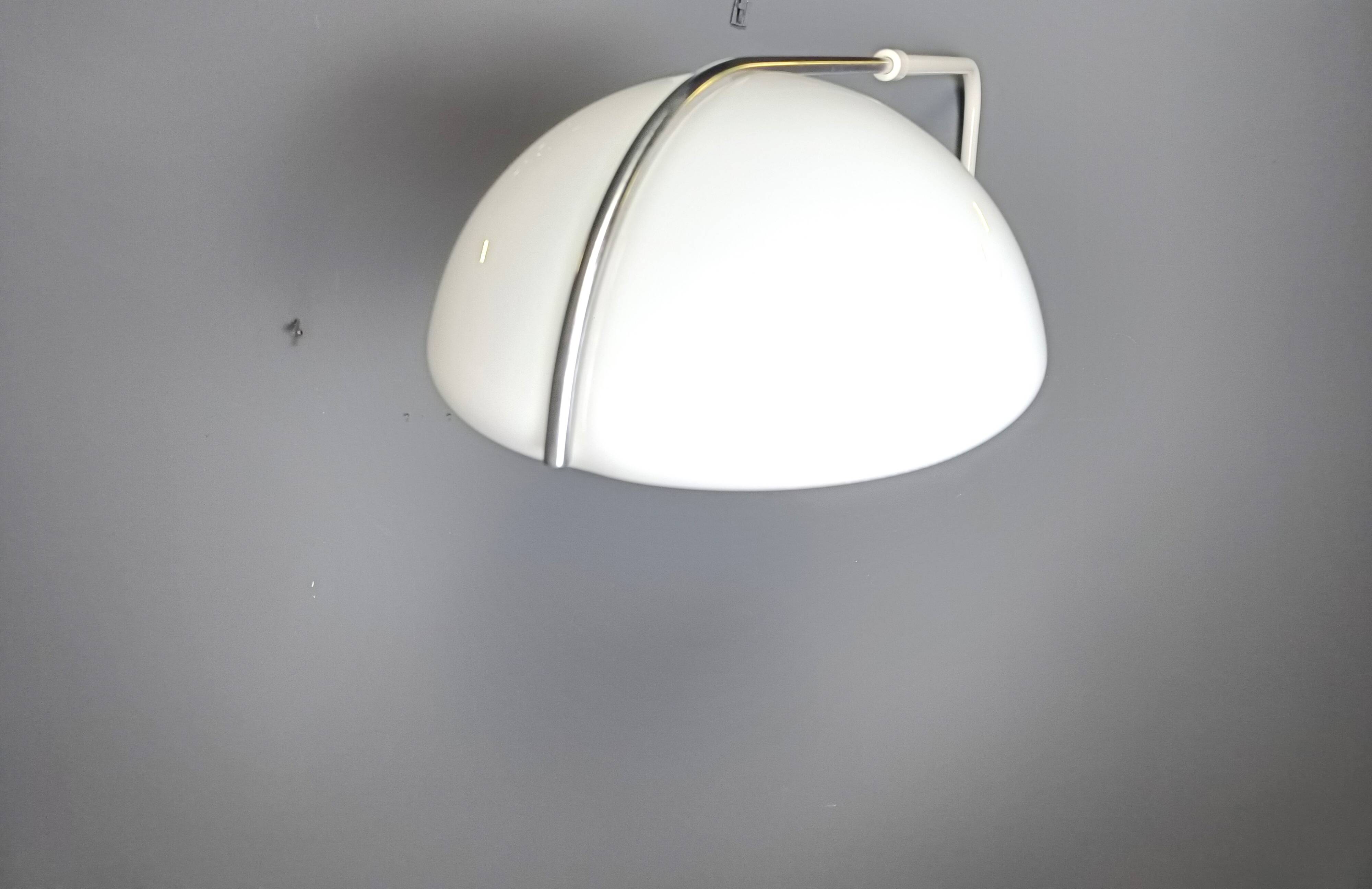 Vintage wall lamp by Luigi Massoni for Guzzini, 1970s