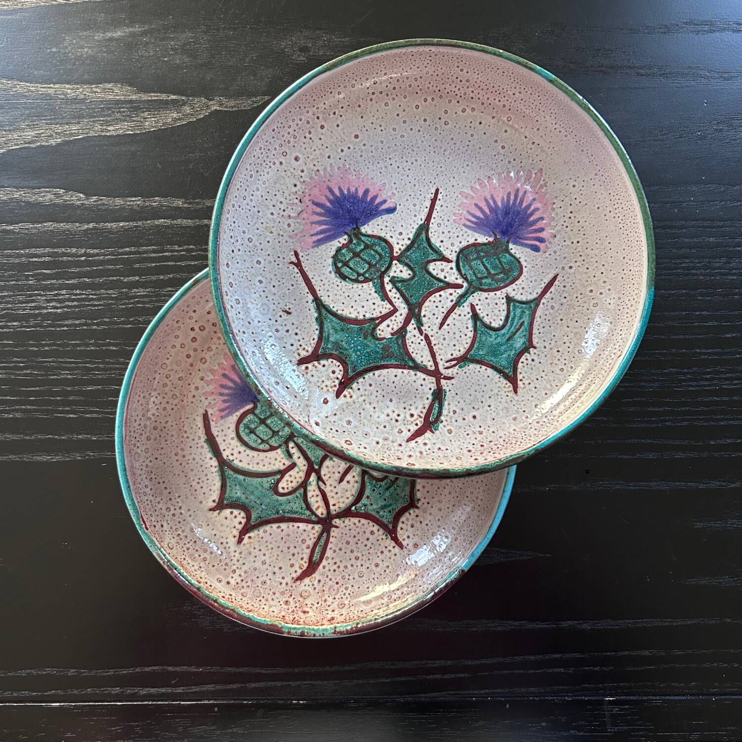 Pair of plates with thistle decoration