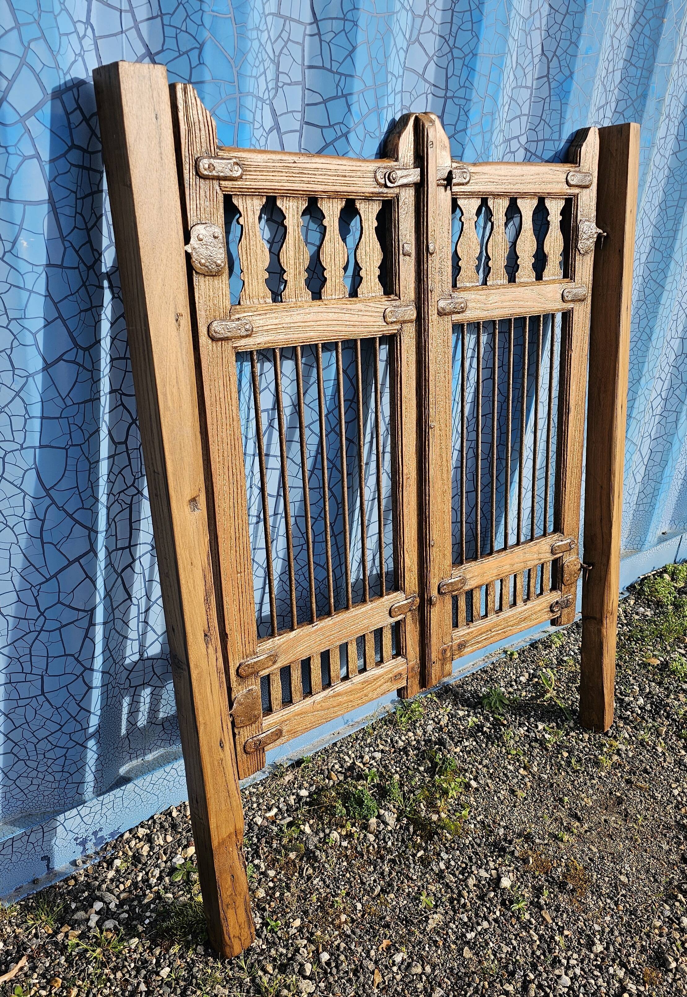 Old garden gate in solid teak