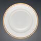 Round porcelain dish from Limoges golden tower