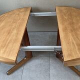 Table scandinave ronde vintage à pied central étoile extensible, éditée par baumann