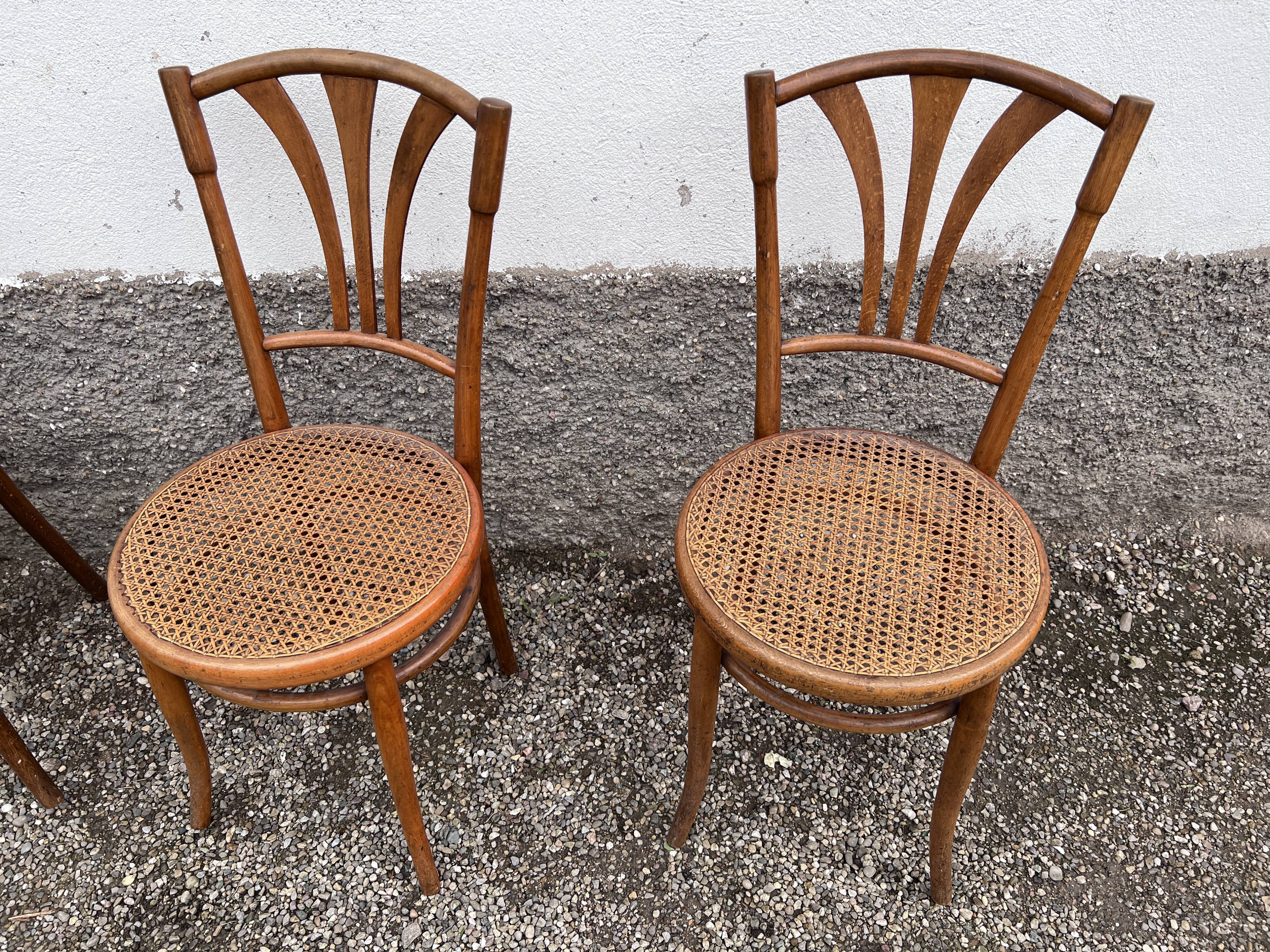 Series of 4 wooden chairs and cannage