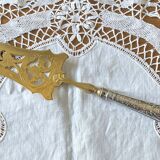 Openwork pie server in silver with Minerva hallmark and gilded metal