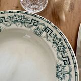 Set of eight Moulin des loups soup plates