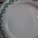 Old mismatched iron earthenware dessert plates accompanied by a dish