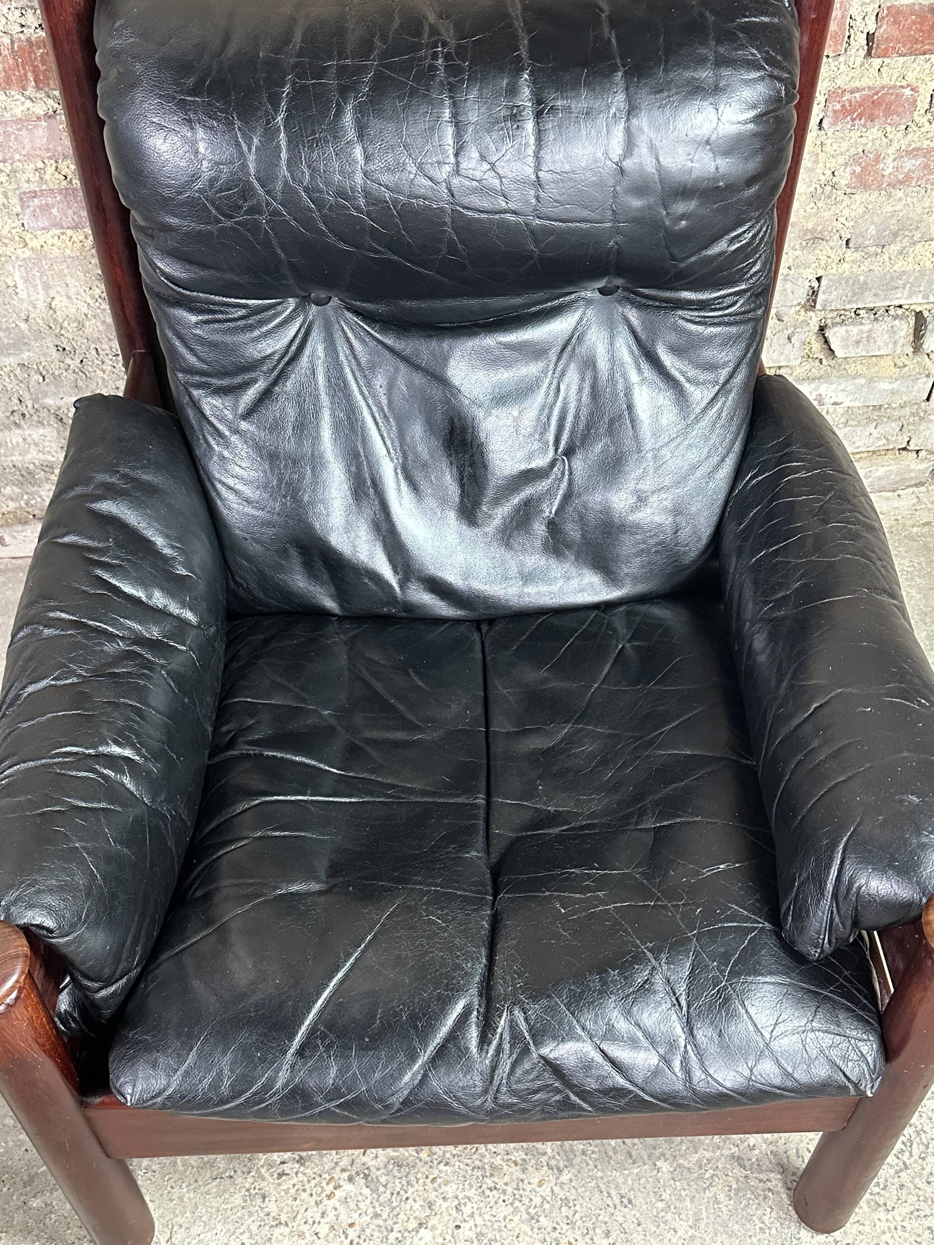 Admiral armchair and its ottoman by Erik Merthen Sweden vintage 1960