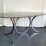 Dining table in chromed metal and smoked glass 1970