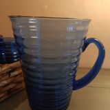 Orangeade carafe service and 6 glasses in a wicker basket
