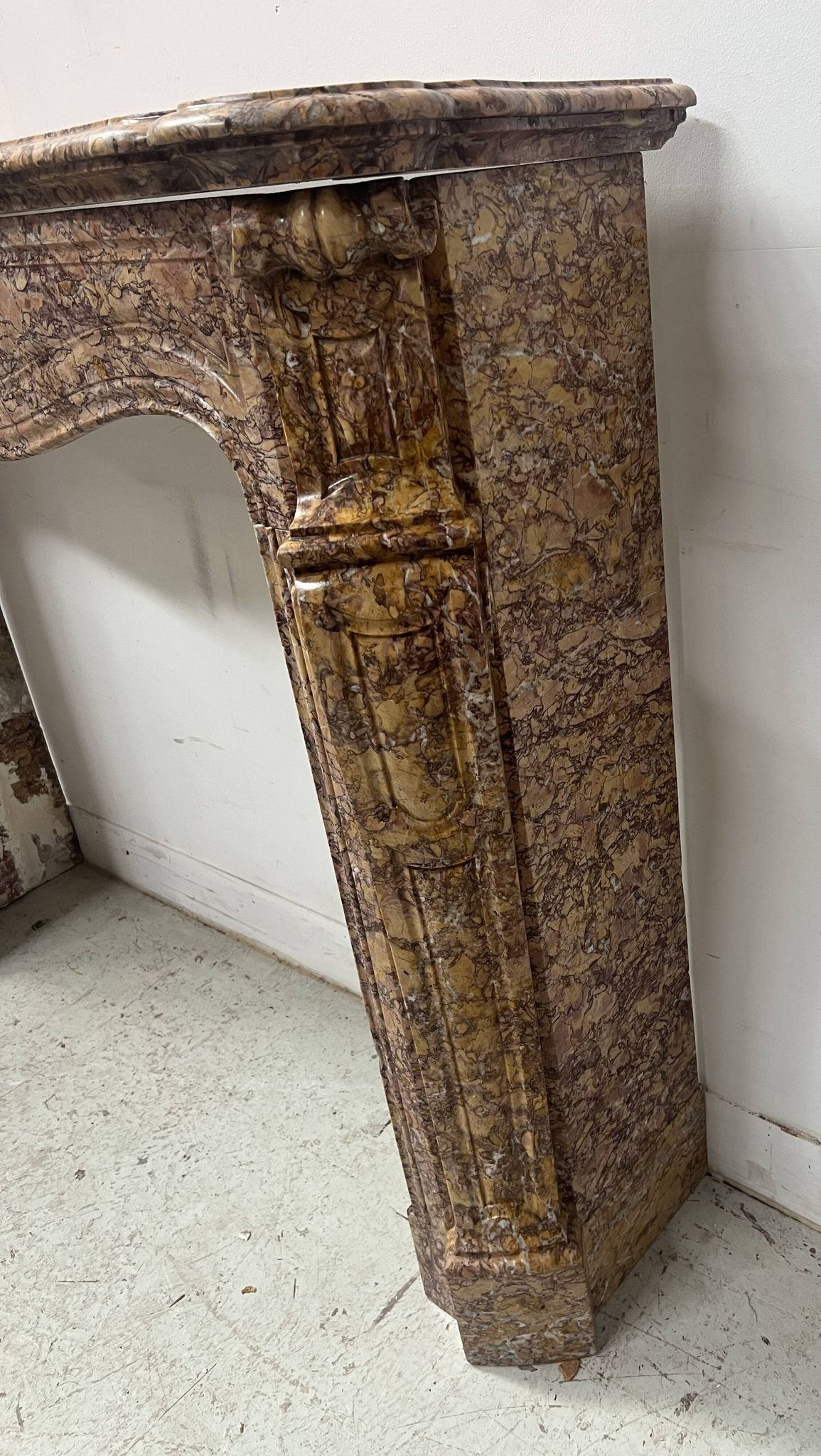 Louis XV style fireplace, Pompadour model, speckled breccia marble, 19th century