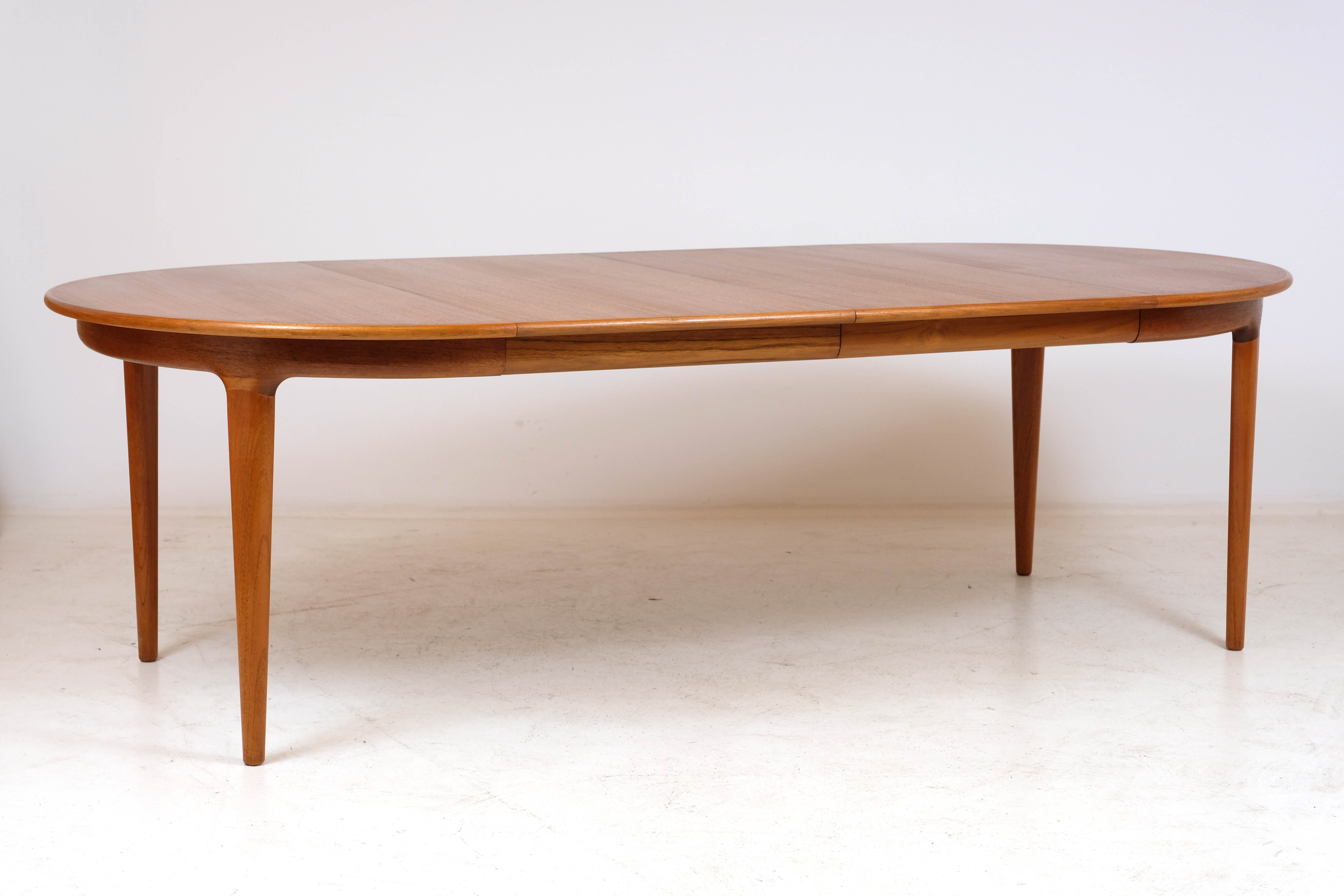 Teak extension table by J. Andersen for Uldum 1960
