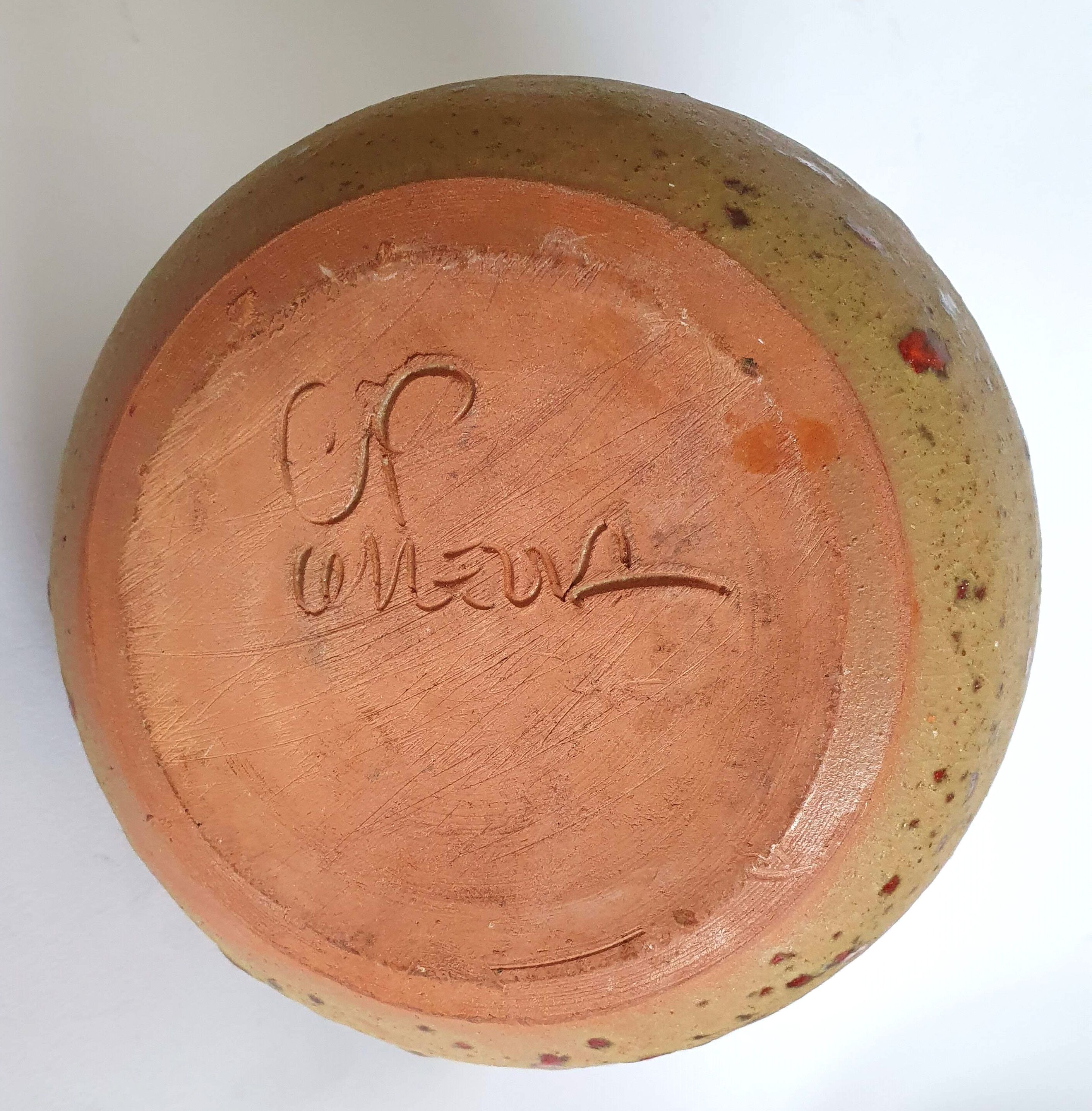 Red speckled stoneware pitcher by Campo Piano Orezza