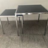 Pair of nesting tables in chromed metal and glass