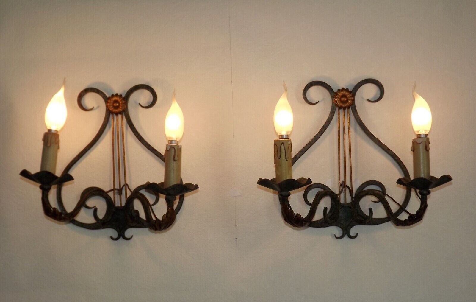 Pair of old antique French double lyre shape green wrought iron wall sconces