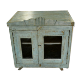 Showcase on grey blue glass 2 feet wearing old teak wood