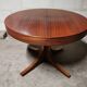 Rosewood extendable round table by Luigi Bartolini. vintage dining room 1960/70