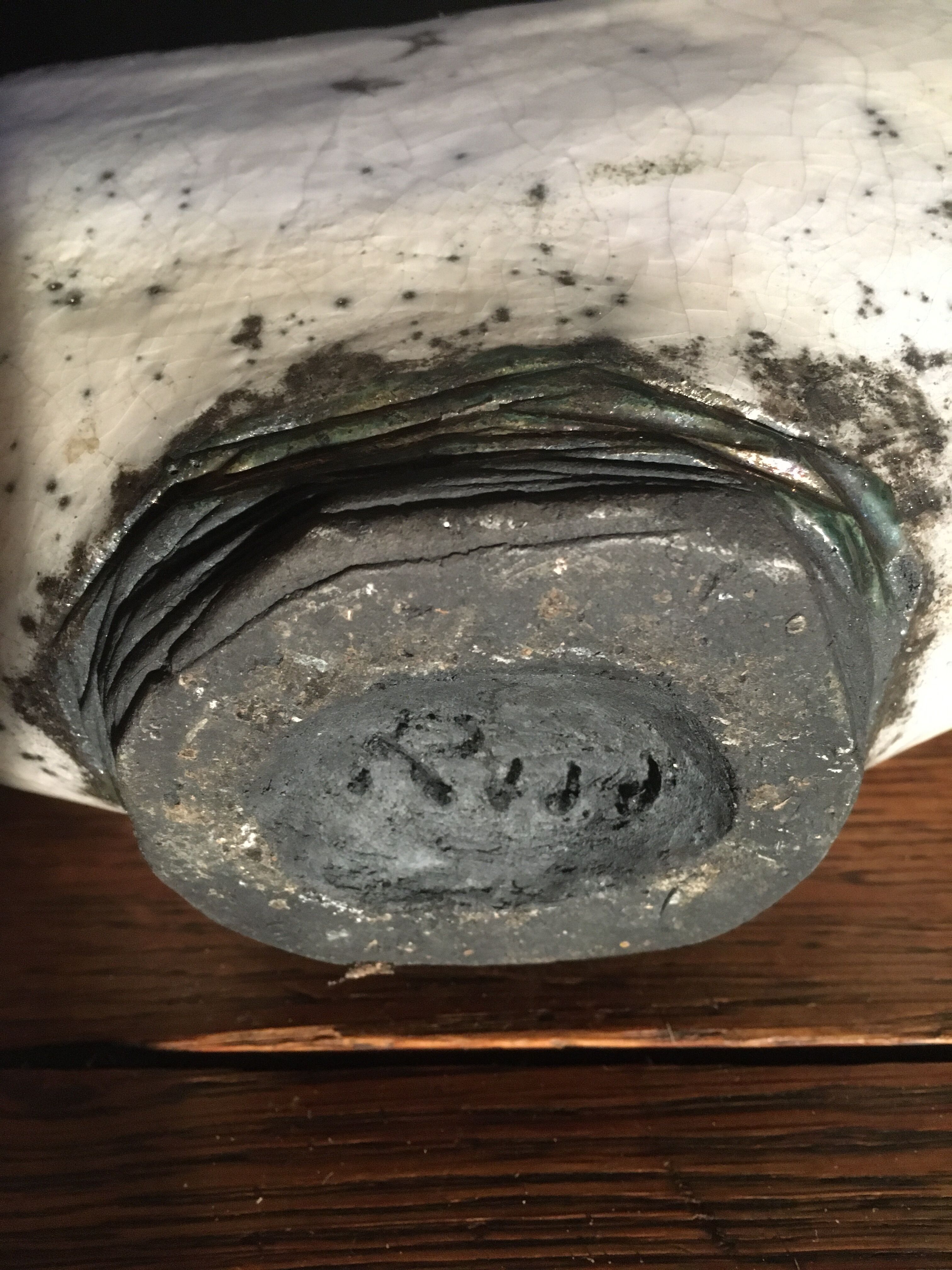 Enamelled ceramic bottle signed