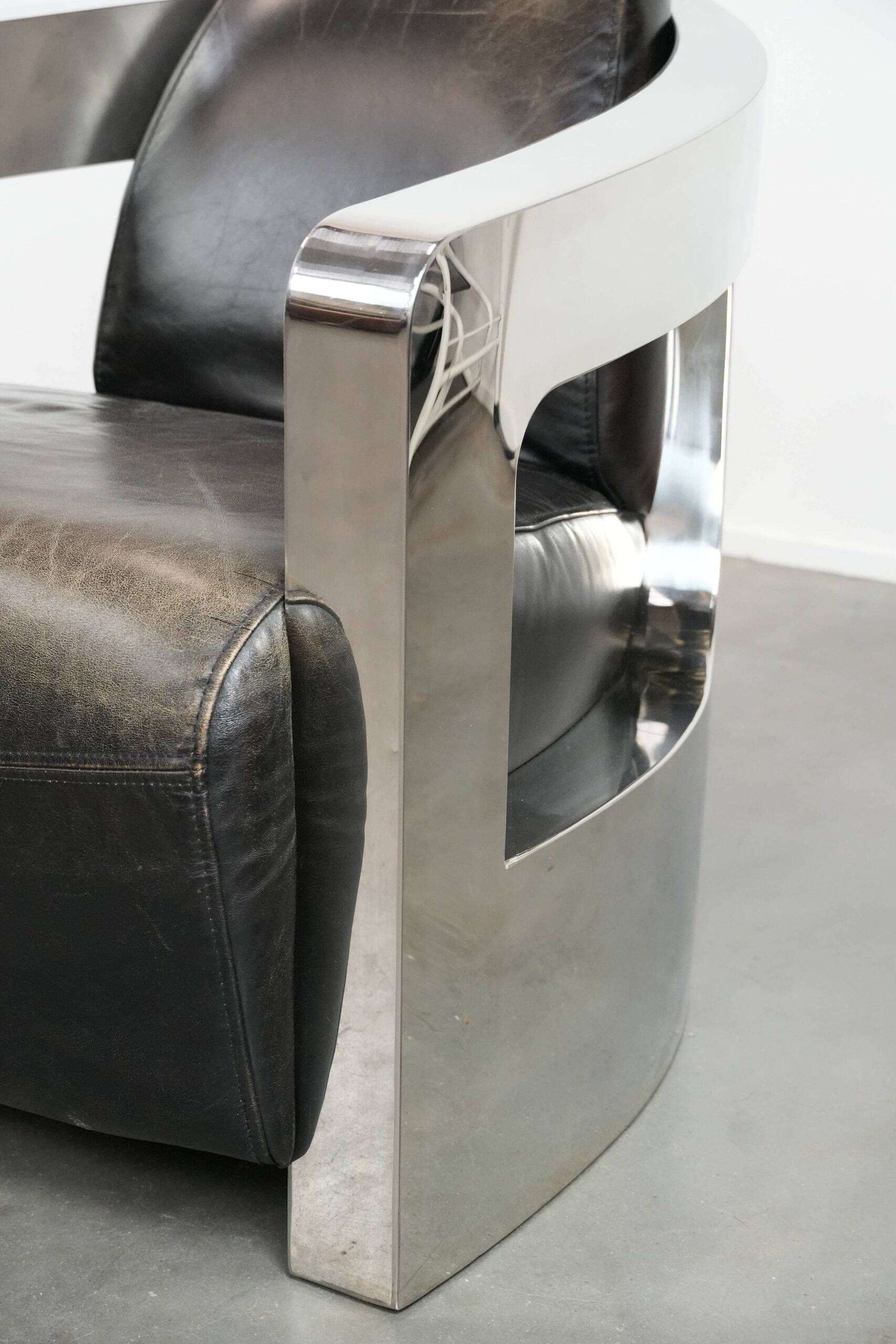 Set of two cowhide leather Aviator design armchairs with aluminium
