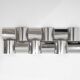 Contemporary wall light in stainless steel and metal.