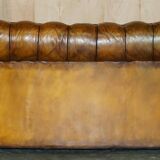 Vintage Chesterfield leather sofa bed, fully restored, circa 1940.