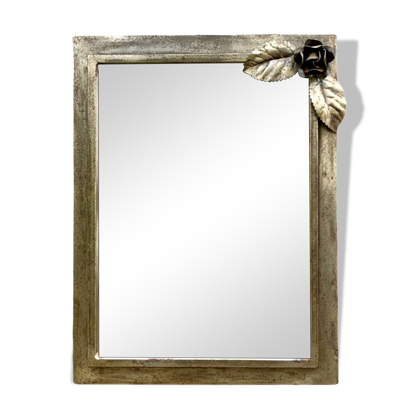 Vintage wall mirror in varnished steel decorated with a rose in relief