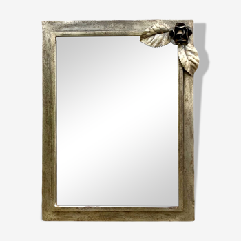 Vintage wall mirror in varnished steel decorated with a rose in relief