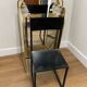 Vintage triptych mirror in brass with wall lights.