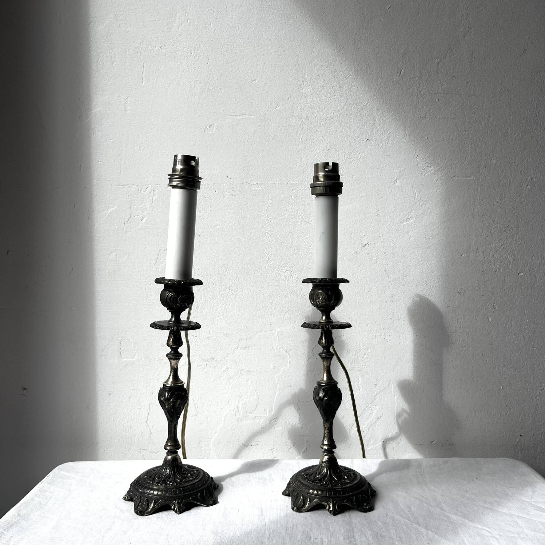 Pair of antique candlestick lamp bases