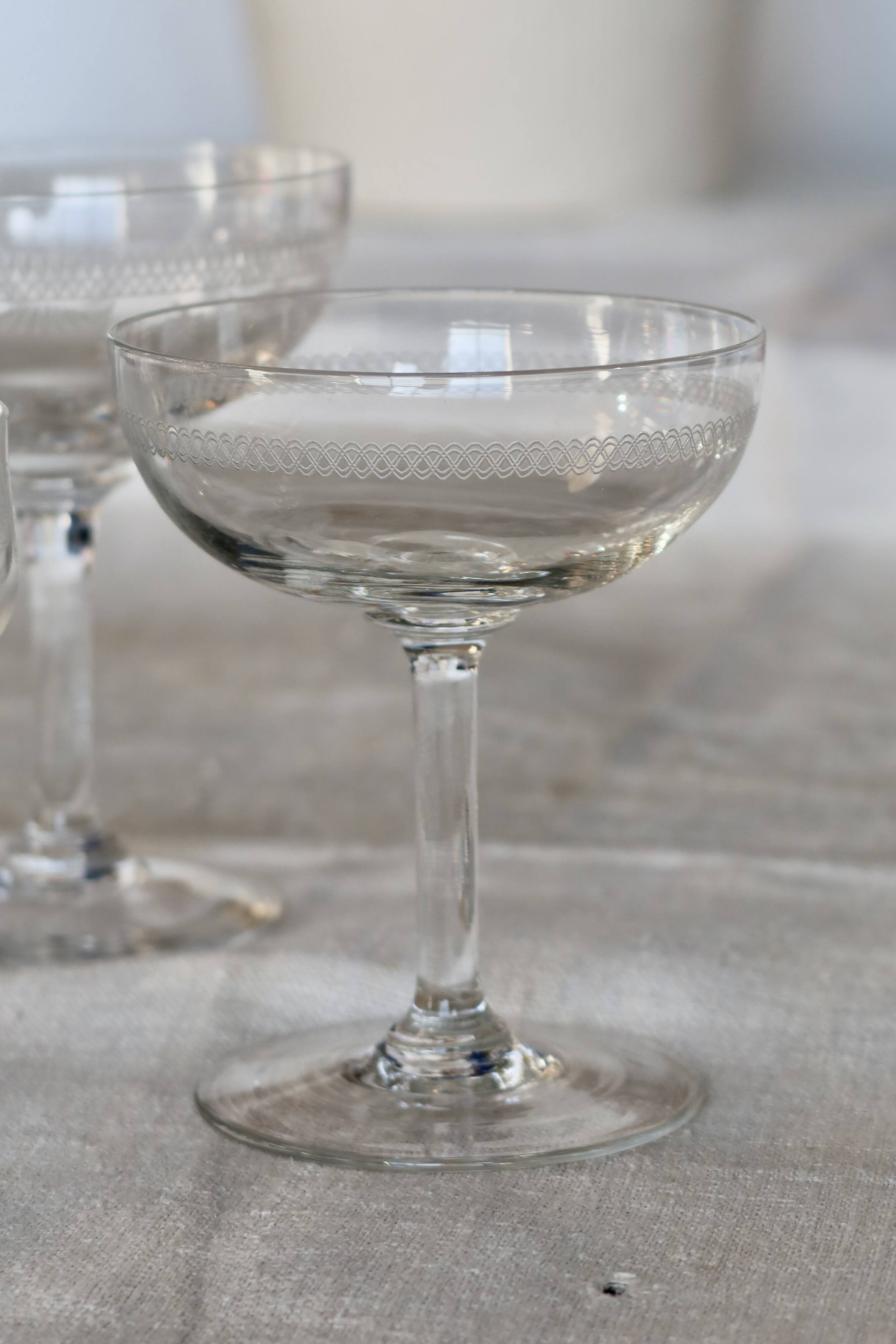 Mismatched vintage cut crystal champagne glasses