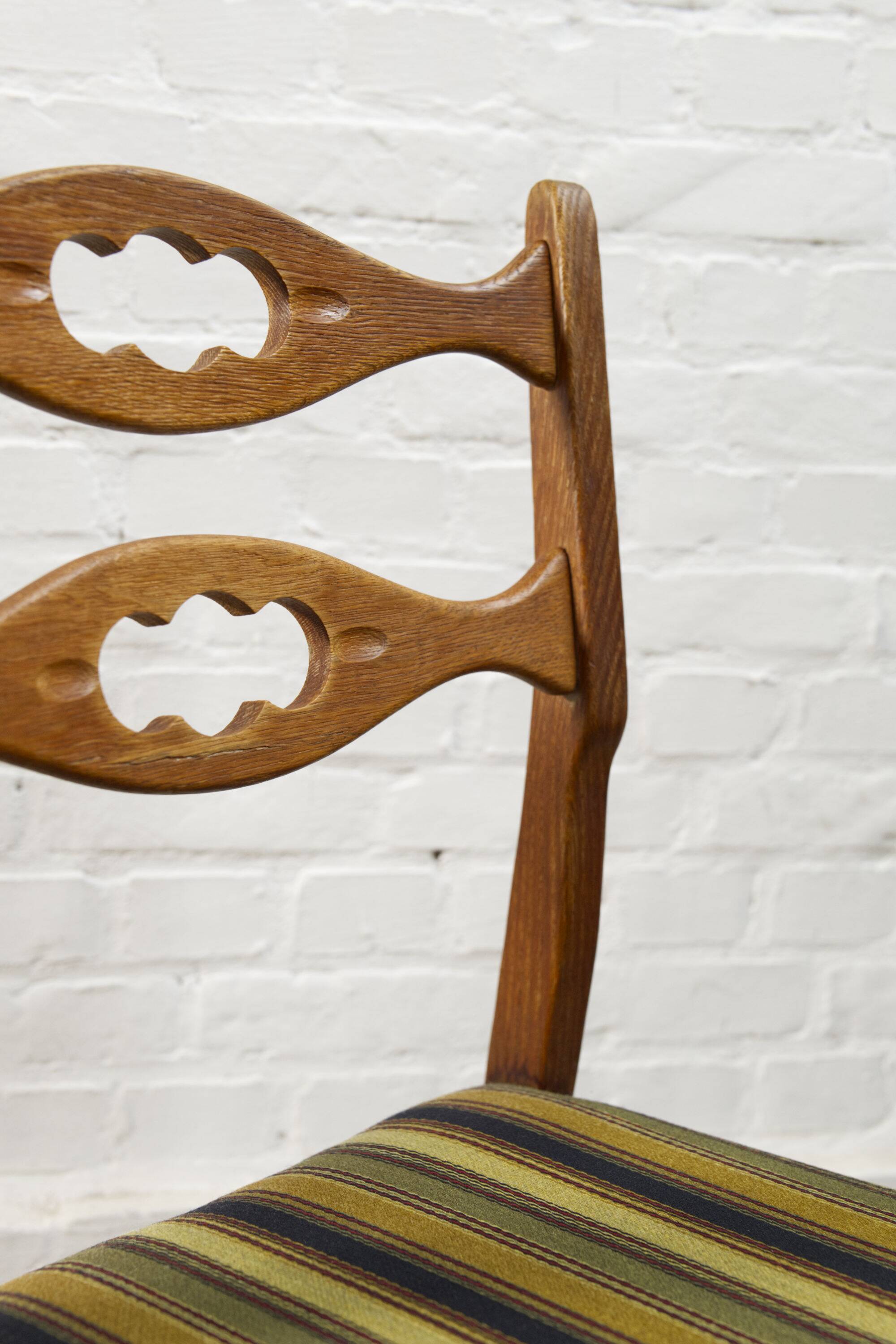 Set of four oak and wool dining room chairs by Henning Kjaernulf, 1960's