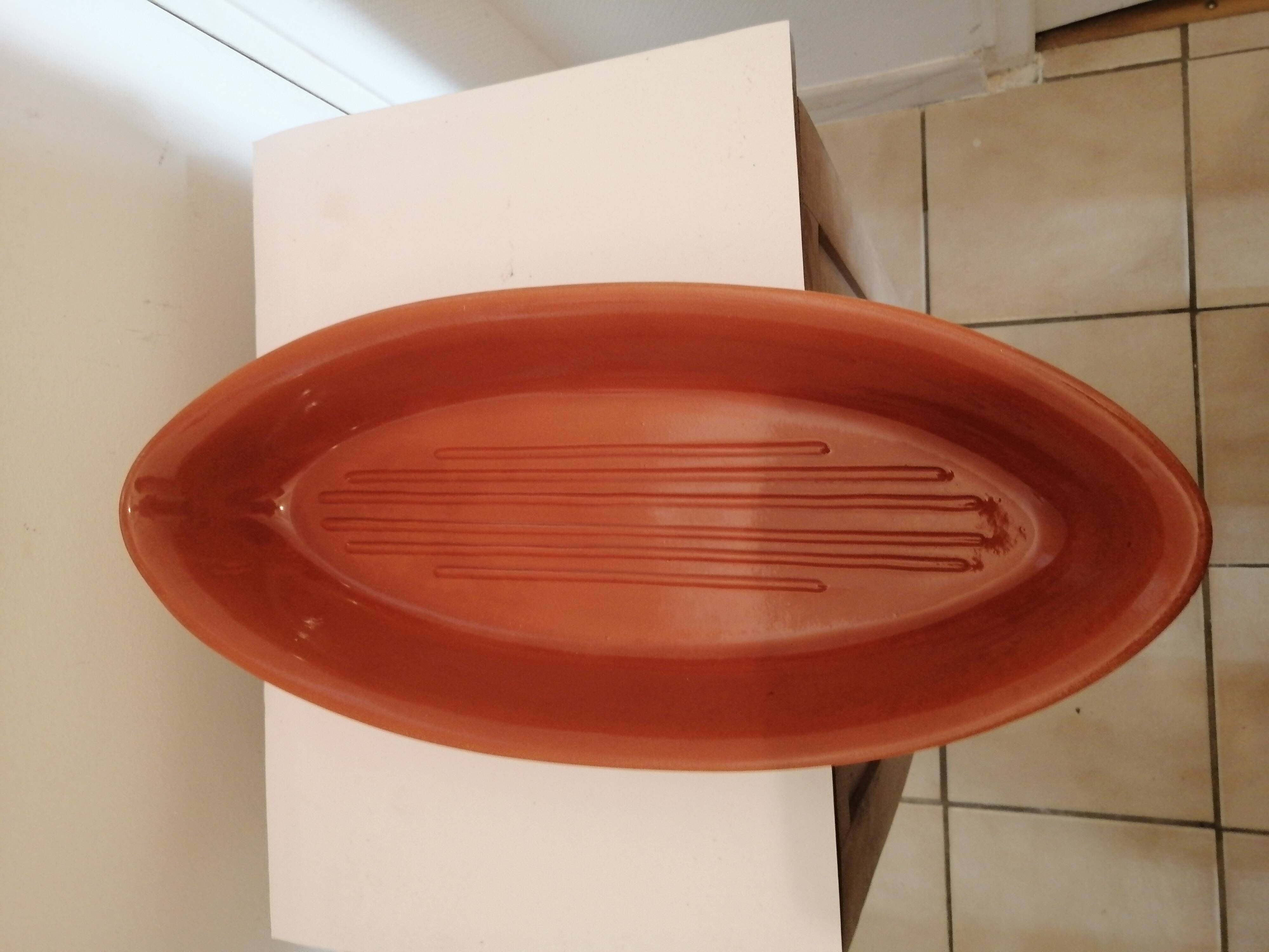 Fish shaped terracotta cooking dish