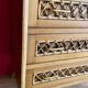60s rattan and compass feet dresser