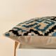 Ikat cushion in blue and black velvet