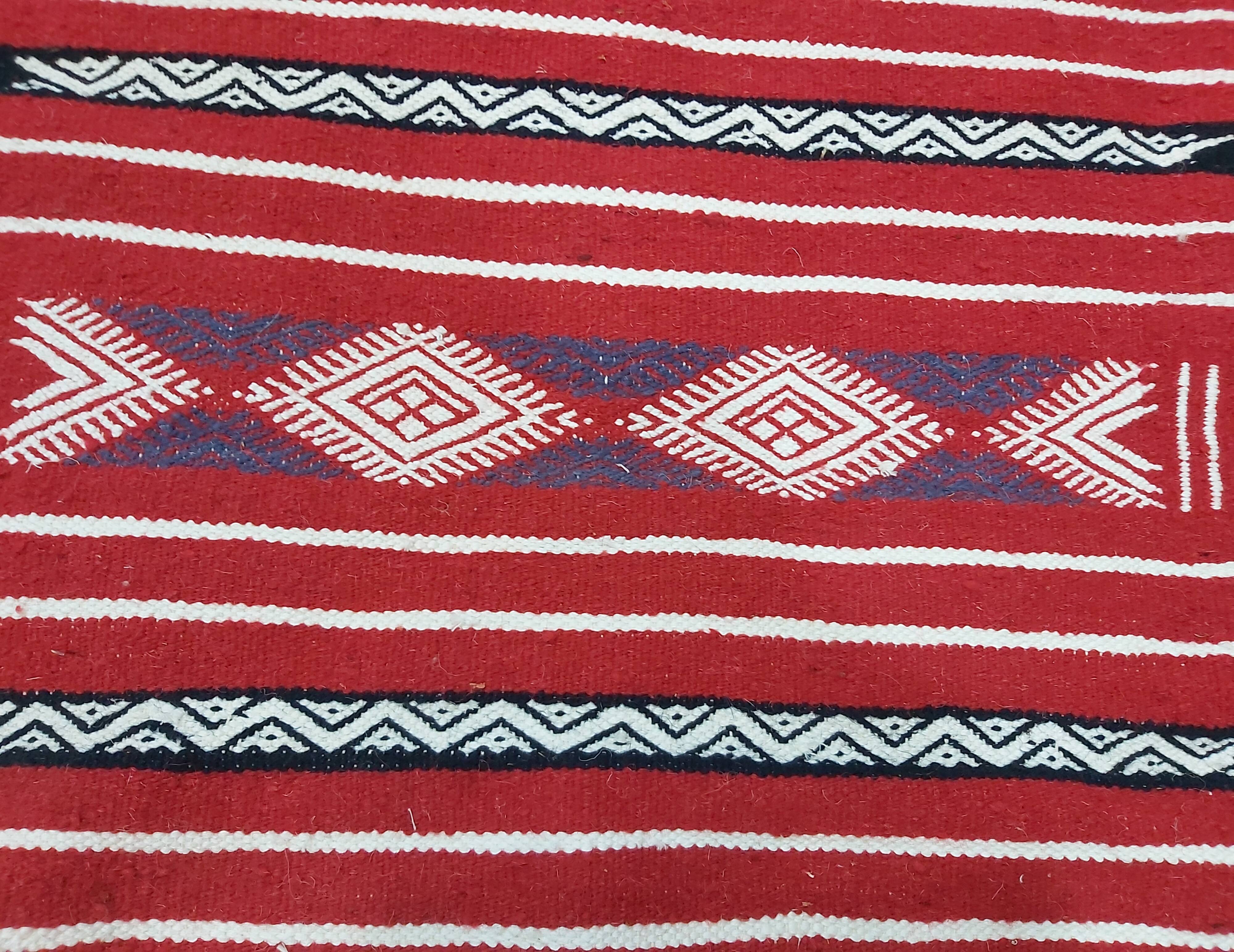 Traditional red kilim carpet
