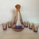 Old sailing decanter and 5 small matching liquor glasses