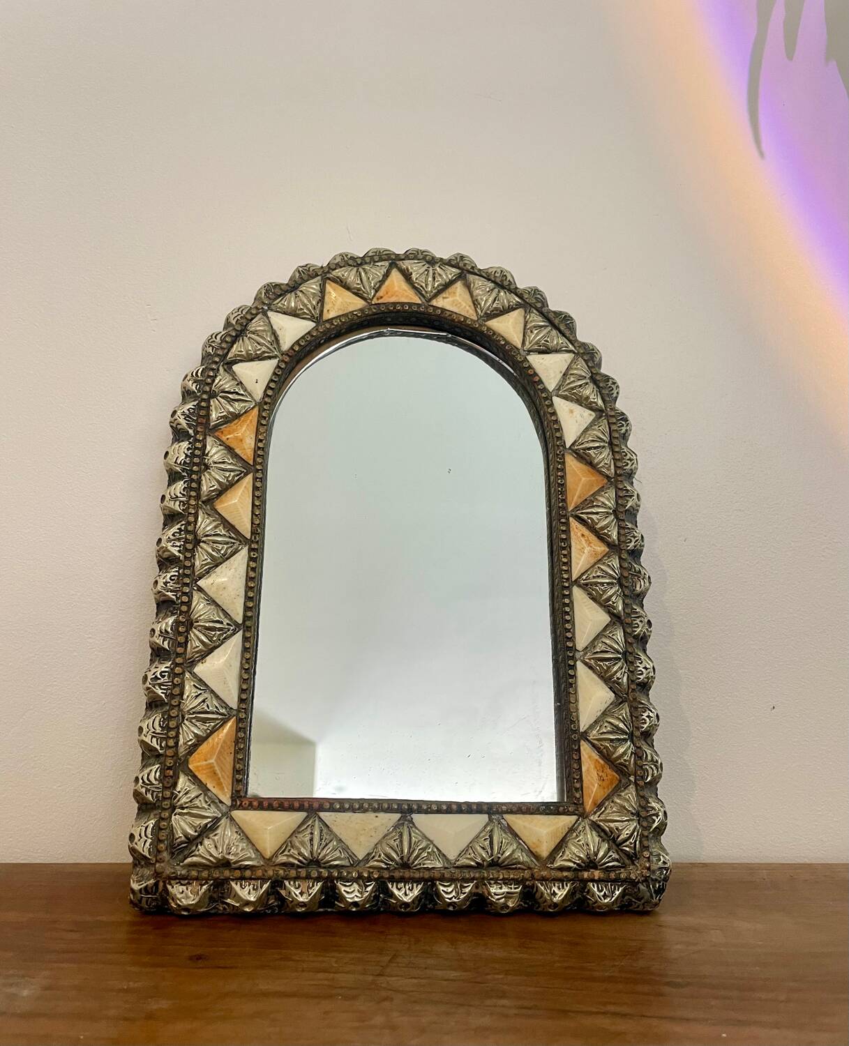 Oriental bone mirror