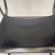 Vintage chair in saddle leather black steel 1970s