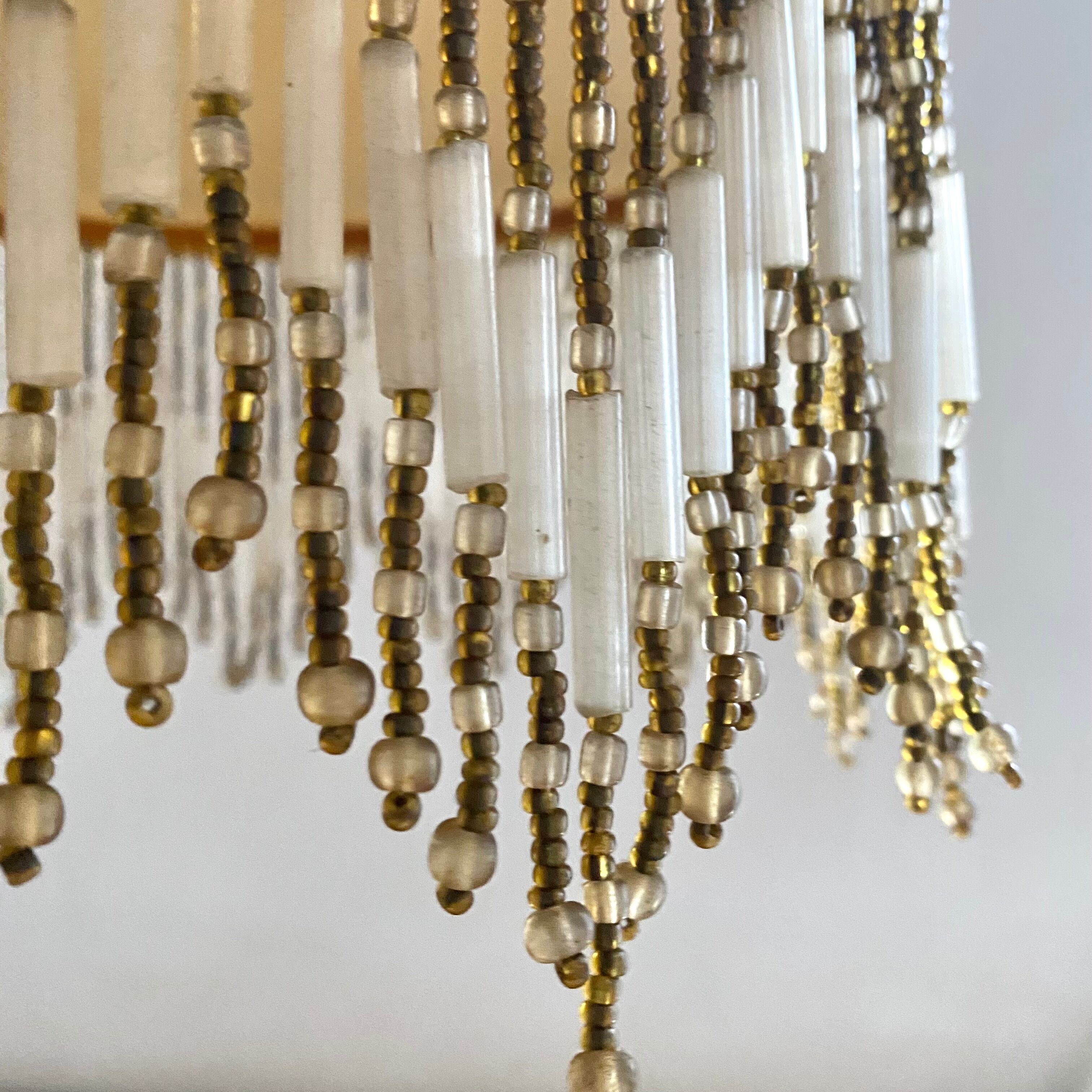 Amber polished glass and pearl suspension