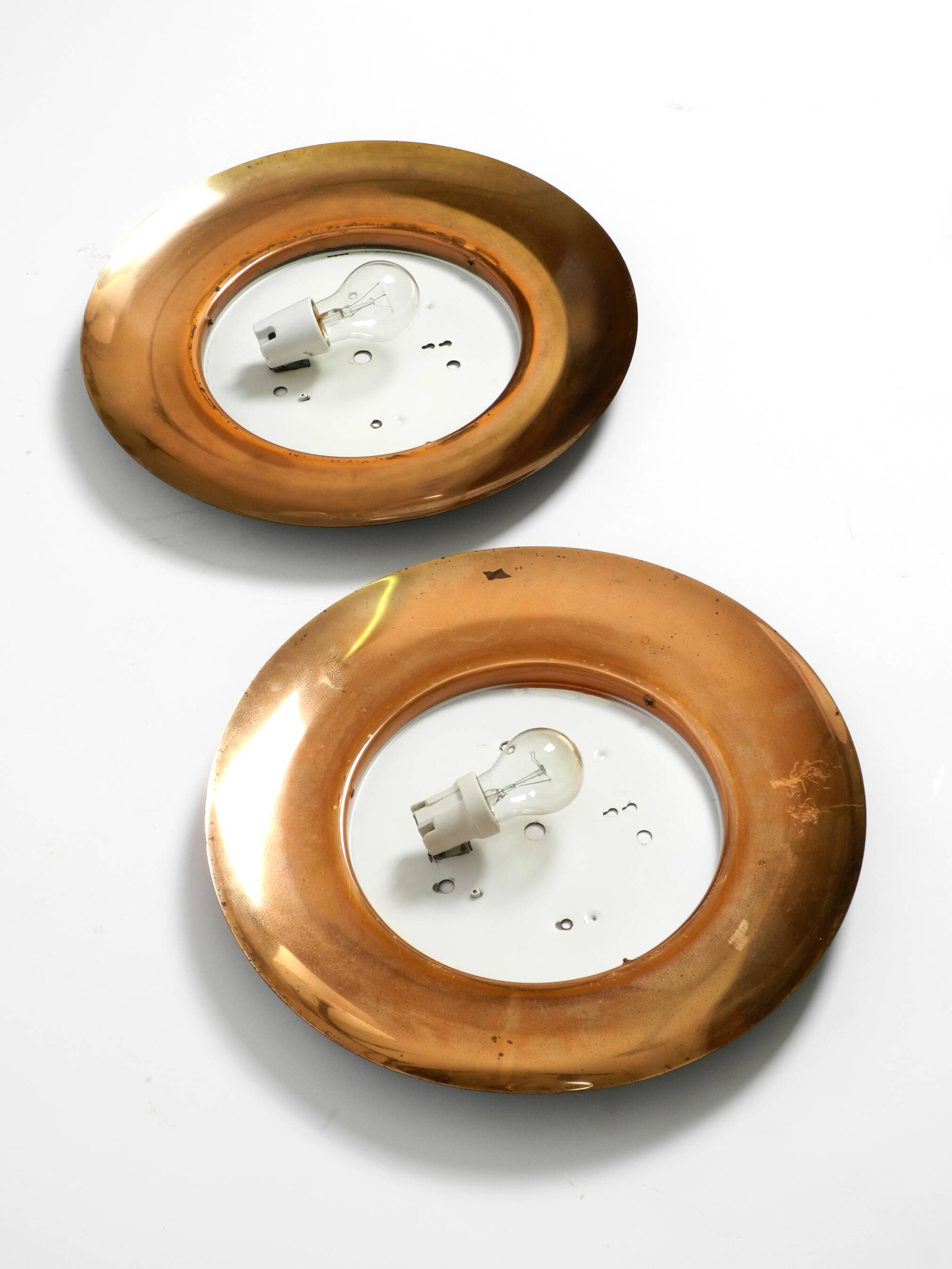 Pair of Mid Century wall or ceiling lamps made of glass with copper-plated